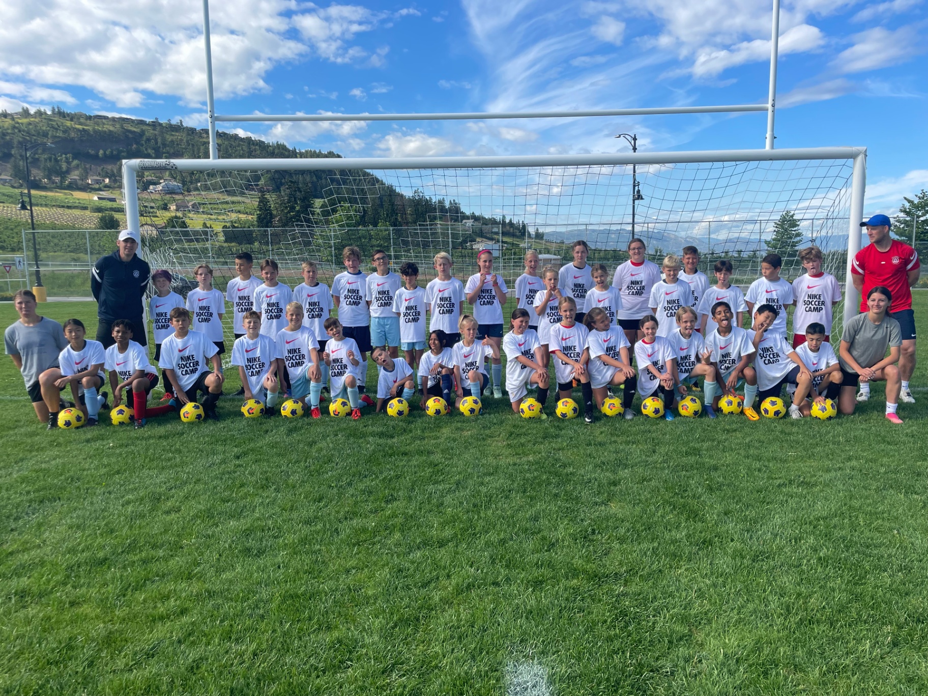 Victorem Football camp group photo on the pitch